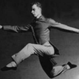 A dancer mid-leap