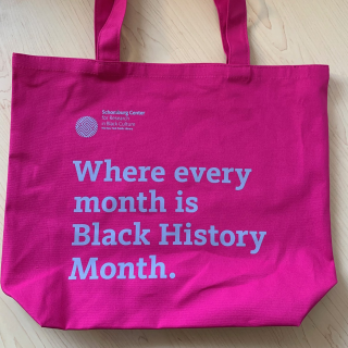 Image of a pink Schomburg tote bag.