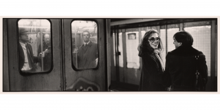 Historic photo of people in a subway train and on a subway platform